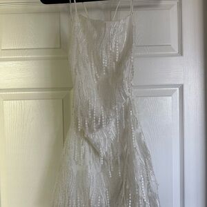 Lulu’s Making Magic White Fringe Lace Up Dress